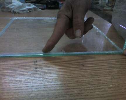 finger and push the sealer to seal the bottom side and corners.