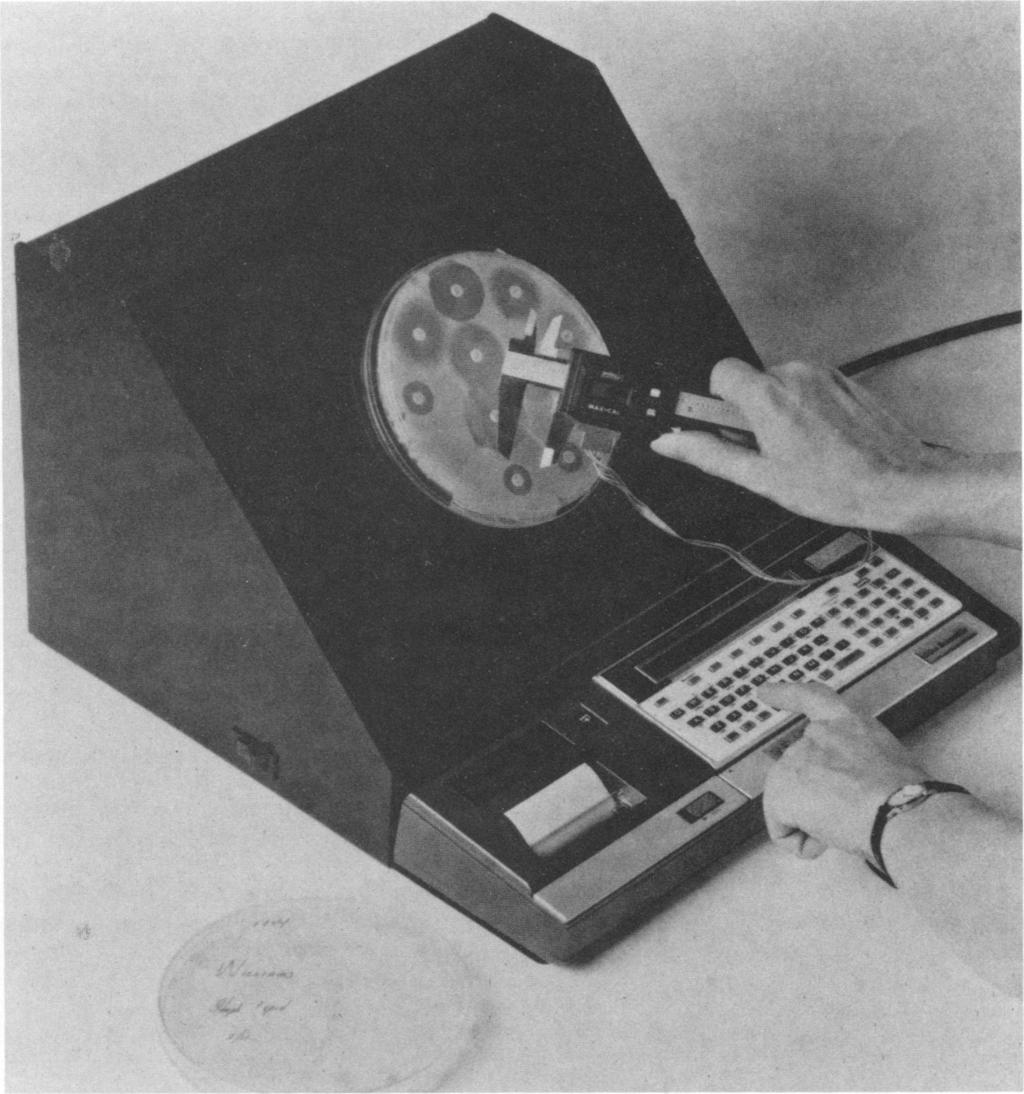 VOL. 22, 1985 BIOGRAM ANTIMICROBIAL SUSCEPTIBILITY TEST SYSTEM 795 FIG. 1. The BIOGRAM system consists of a preprogrammed computer, electronic calipers, printer, and light source.