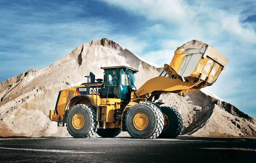 LOADERS AND DOZERS 55228 Also Includes Pallet Fork The Cat 980K Wheel Loader improves operator comfort,