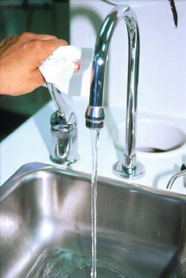 23. If using a hand operated faucet, use the towel to turn off the