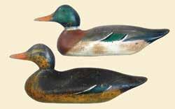 24(PR) 25 26 27 28 29 30 31 32 24. Pair of early Peterson/Mason Factory mallards. Both with tack eyes and neck filler replacement. Predominantly original paint on both.