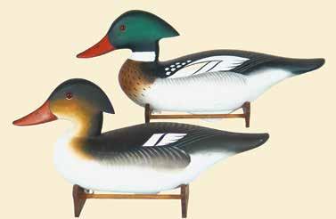 Signed with the address on the bottom as well as the notation: -1990-. 550-750 58(PR) 56. Matched pair of miniature widgeon by Charles Joiner.