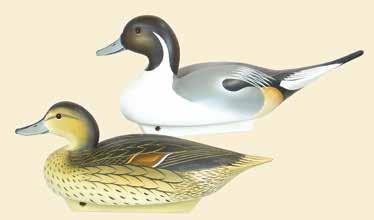 Both signed with the address on the bottom and the hen dated -1988-. 450-750 60. Matched pair of miniature pintails by Charles Joiner.