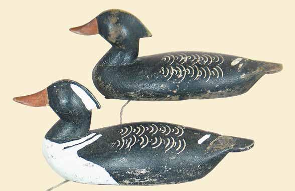 Oliver King 102(PR) 103 104 102. Rare pair of hooded mergansers by Oliver King (b1908) of Port Severn, Ontario. Carved wingtips and swept back crest.