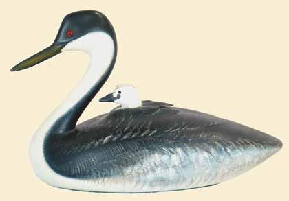 Carvings and Decoys by Some of America s Best Folk Artists 1 2 3 4 5 1. Life size western grebe with chick by Frank Finney. Hollow carved.