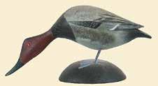 Mounted on a painted rock base. Pre stamp with blue jay written on base. 1800-2400 Provenance: WPT collection 142. American merganser by A.E. Crowell.