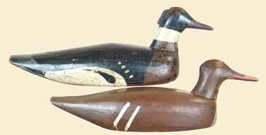 213(PR) 214 215 213. Rig mate pair of early mergansers from Port Clyde, Maine. Elongated bodies with a subtle crest on the hen and a nice carved crest on the drake.