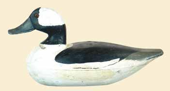 245(5) 246 246. Hollow carved bufflehead drake. Body seam at mid body with a small flat area on base. Lightly scratched feather detail on back.