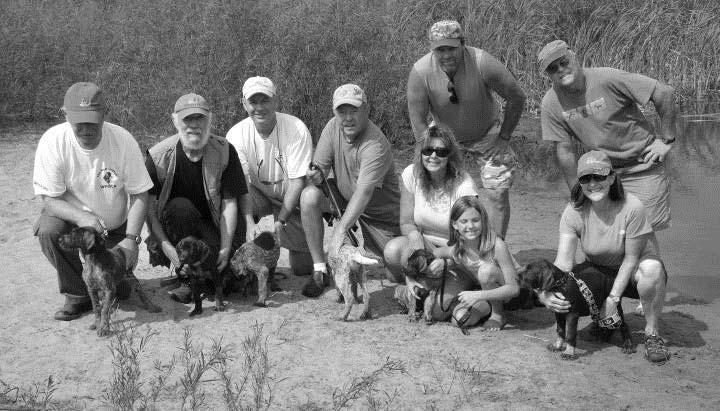 Page 22 THE GUN DOG SUPREME February 2014 On Their Way! Here s the Dutchman s Hollow H Litter (part of it) posing with their new families at the Heartland Fall Test.