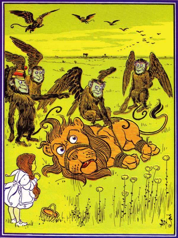 106 Some of the Monkeys seized the Tin Woodman and carried him through the air until they were over a country thickly covered with sharp rocks.