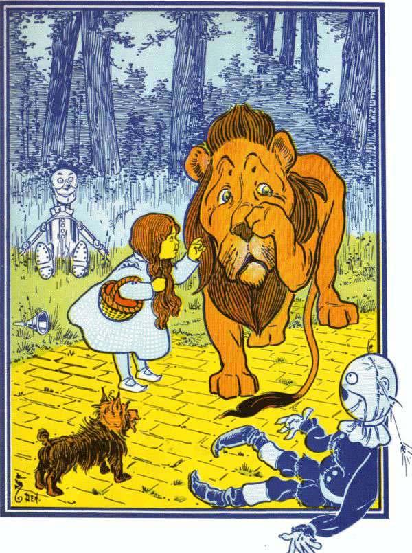 42 Dorothy, fearing Toto would be killed, and heedless of danger, rushed forward and slapped the Lion upon his nose as hard as she could, while she cried out: "Don't you dare to bite Toto!