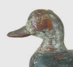 Interesting, hollow Canada goose with head turned to the right. Attributed to the Chincoteague area of Virginia but found in Jamestown, Rhode Island. Carved wing tips.