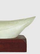 Mounted on a hardwood base with an illegible stamp which depicts a decoy in the middle of a decoy anchor. 100-200 211.