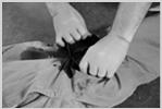 Wound Packing (1 of 5) Wound Packing (2 of 5) Wound Packing (3 of 5) Open clothing around the