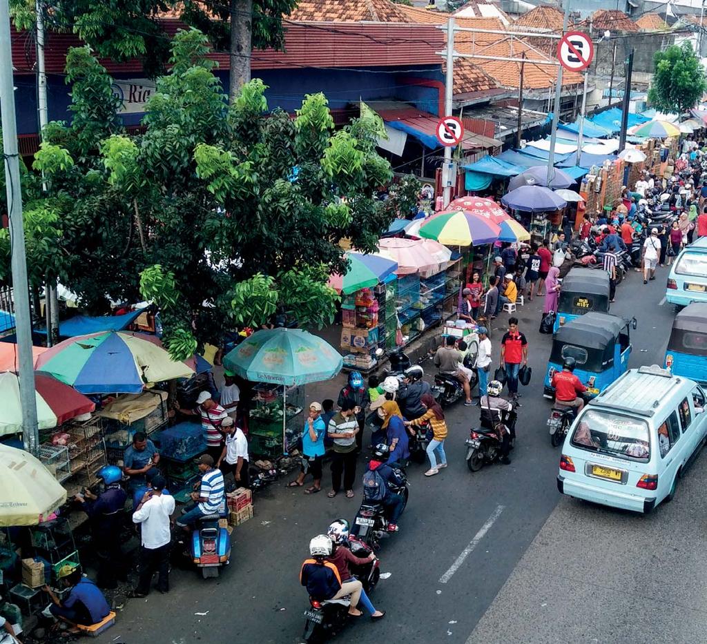 Photo 3: (Top) Jatinegara Bird Market.