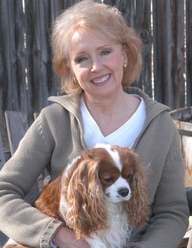 About the Artist Lindsey Bittner Graham Lindsey Bittner Graham is a national award winning oil painter, who also happens to share in our love of Cavaliers.