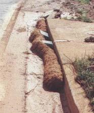 because water would wash underneath the gaps between the blocks, dumping sediment into the basins. The coir wattles are much easier to install and maintain.
