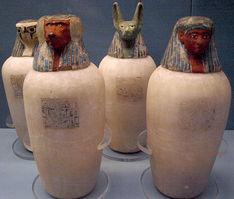 How Did Ancient Egyptians Make Mummies? By Cindy Grigg Caption: Canopic jars of Neskhons, wife of Pinedjem II. Made of calcite, with painted wooden heads.