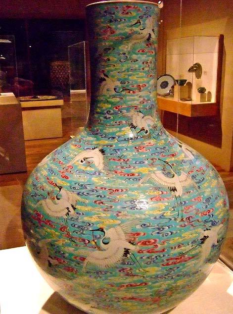 Look closely at this vase. What creature is depicted in several different posisons?