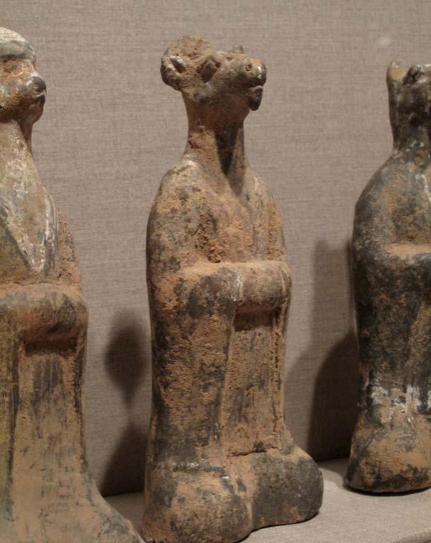 These small figurines represent the animals featured in the Chinese Zodiac. They were honored in ancient households. Standing tall and straight, they are dressed in their ceremonial robes.