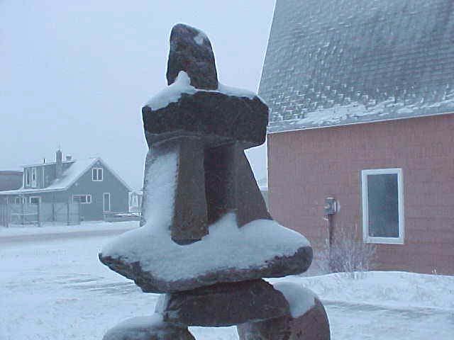 An "inukshuk" (E-NOOK-SHOOK) outside the Eskimo Museum. These stone structures were built all over the arctic by the Inuit and by their forefathers. The inukshuk served many purposes.