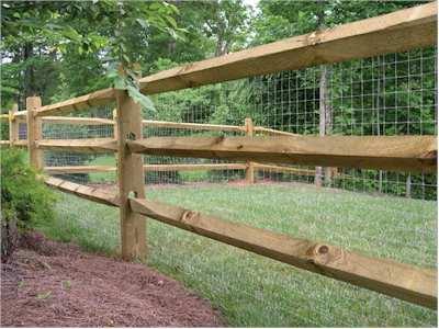 2. SPLIT RAIL WITH MESH This type of fence is recommended in lieu of chain link.