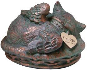 of remembrance. This urn will hold up to a 5 pound pet Measures 9 3/4" x 6 1/2" x 4 ¼.