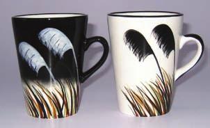original designs are hand painted with underglaze stains on very