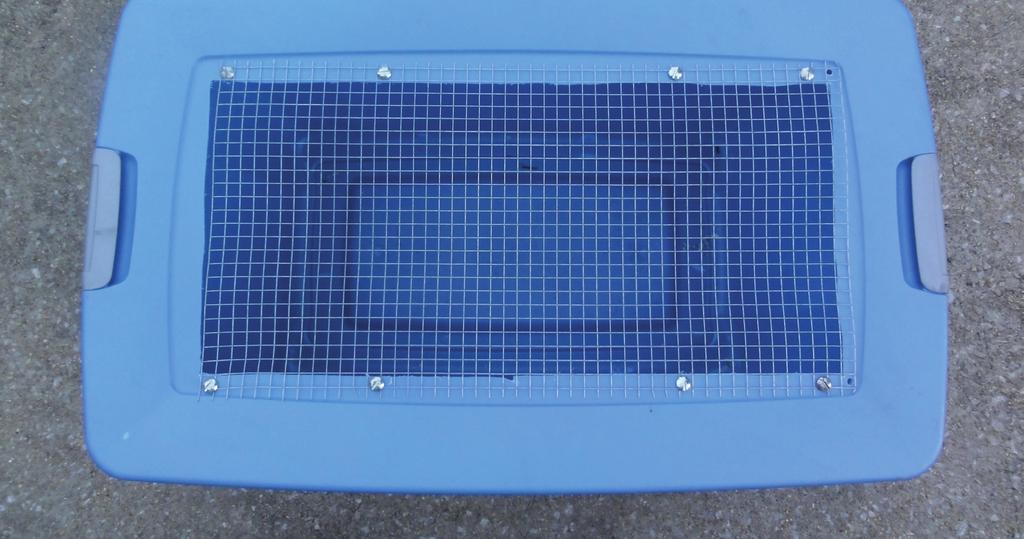 A rubber/plastic homemade brooder box with a wire mesh lid. Everything You Want to Know HOW EASY WILL CLEANING BE?