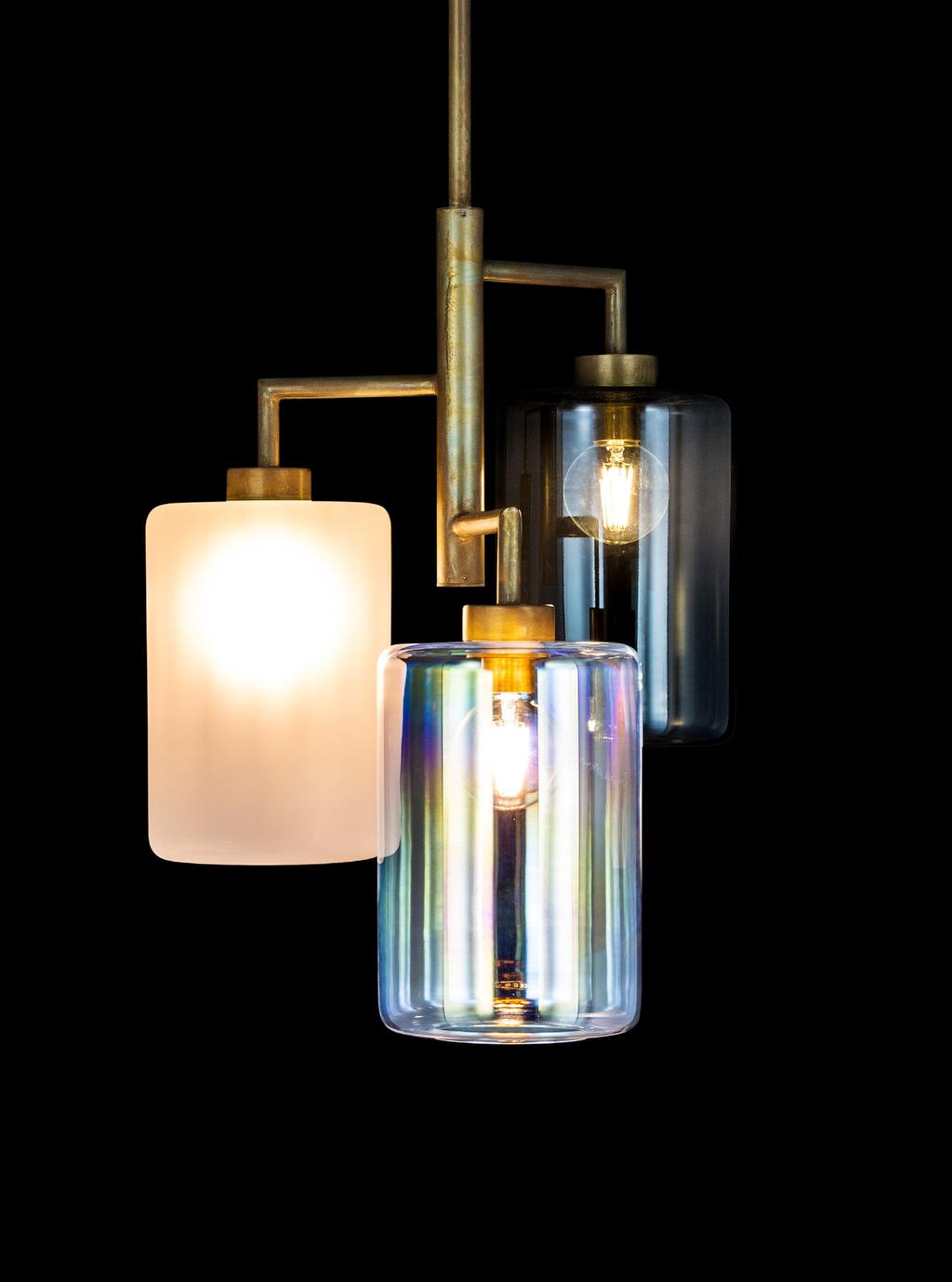 Standard the frame is available in burnished brass, and the lanterns in 4 different types of glass: bronze, clear satin, grey and iridescent.