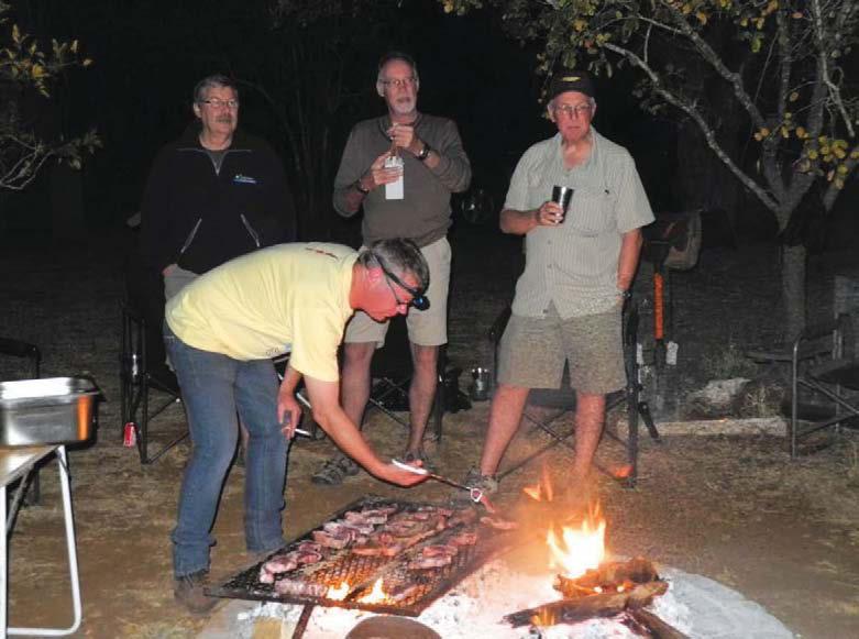 AROUND THE CAMPFIRE Around the campfire this month are (left to right): Godfrey Castle (Caravan & Outdoor Life publisher), braai master Nico Pretorius (Jurgens Ci Sales and Marketing Manager), Allan