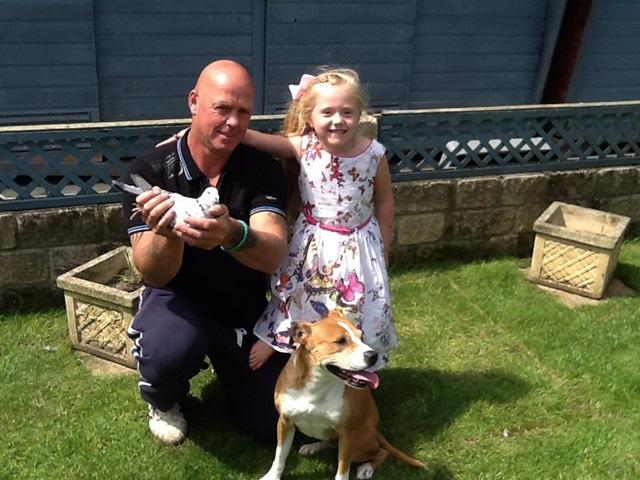Martin Edwards with daughter Tia & Roxey the dog. 10 th Open Hughie Eades of Street timing a 4 year old hen raced on a dual widowhood system.