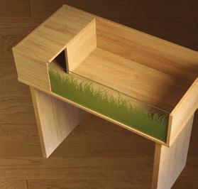 Table features an enclosed sleeping area with hinged