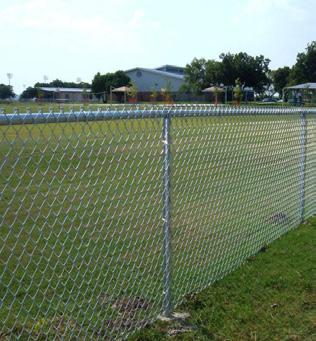 Planting can be established along the base to reduce the visual prominence of the fencing, or gravel strips can be provided along the base of the fence to facilitate lawn mowing.