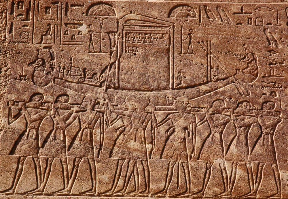 fig. 1. fig. 1. The bark of Amun, carried by files of priests, as represented on the walls of Hatshepsut's Red Chapel at Karnak.