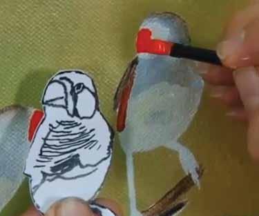 Lay the sheet onto a cutting mat, I like to use the back of the pad, and with a hobby knife carefully cut out each bird. Remember the golden rule and always cut away from your person.