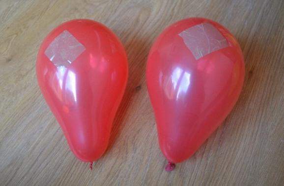 another red balloon and putting sellotape on in.