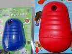 Fill the holes with treats. Med/Large Frog or Bear shape. PYRAMID TREAT TOY Hard Plastic toy.