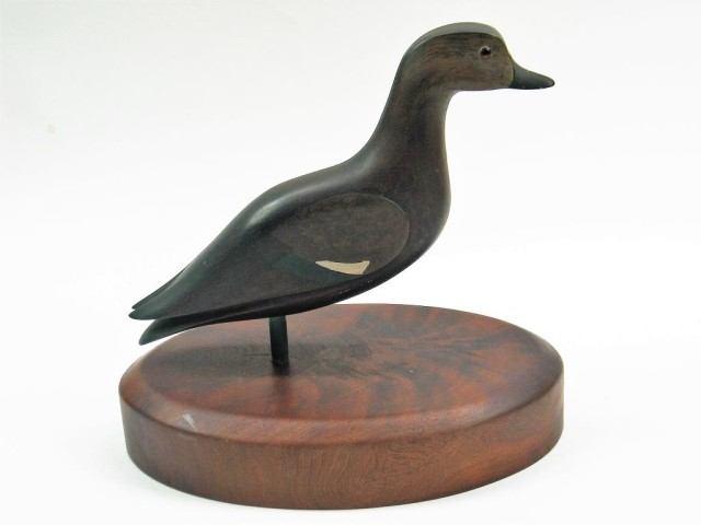 119o Carved Black Duck Carved Black Duck on a