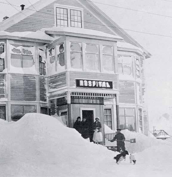 Above: A jar of diphtheria medicine Left: Nurses outside the snowbound hospital in Nome. Inside, Dr. Welsh and his patients waited for the medicine to arrive.