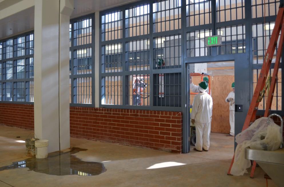 Inmate work crews are painting and putting the finishing touches on two of four new barracks being built at the North Central Unit near Calico Rock.