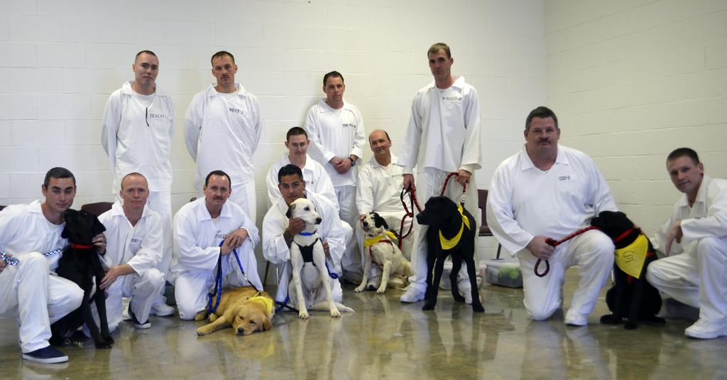 April 2012 Page 9 North Central Unit going to the dogs for Paws in Prison North Central Unit inmates and their PIP dogs