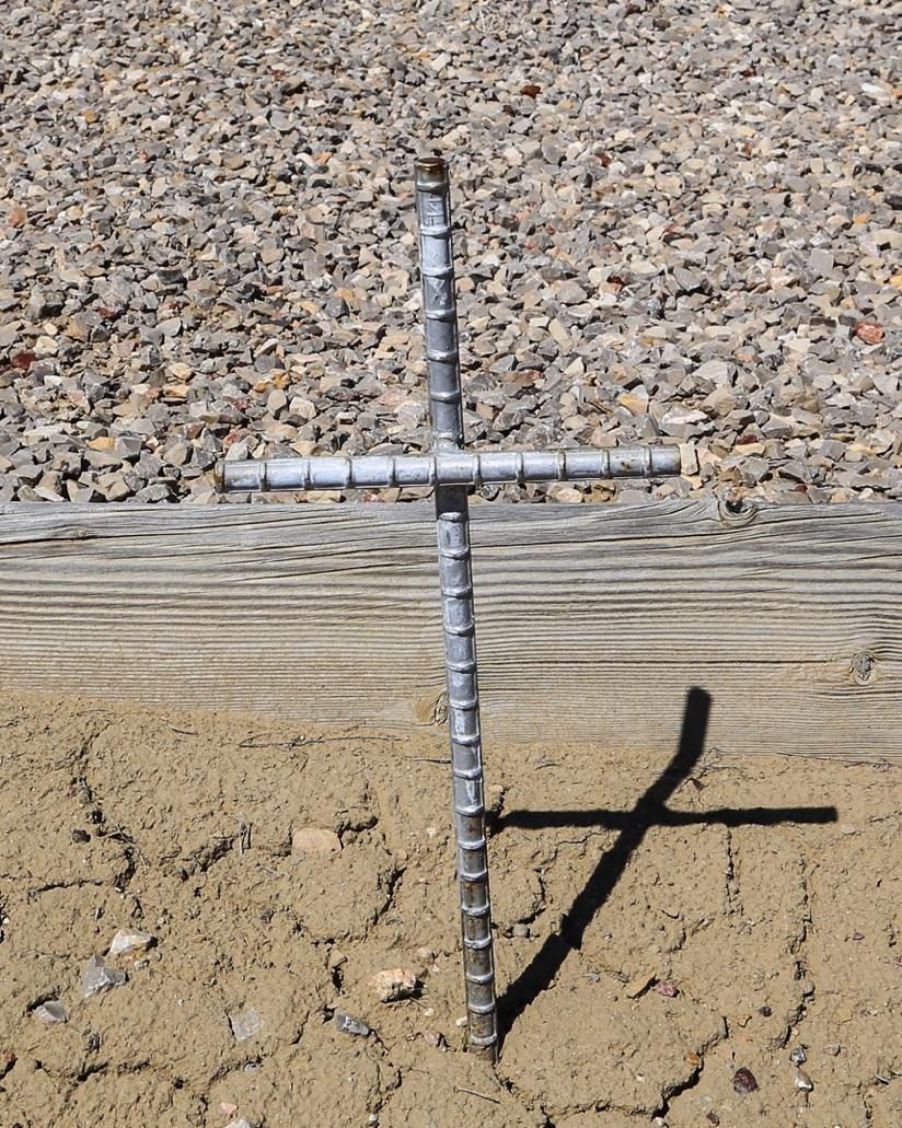 METAL CROSSES THAT MARKED THE GRAVES OF DECEASED MINERS IN THE