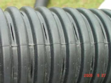 Half of your drain pipe will cover this connection running the long way at the bottom of your grow bed.