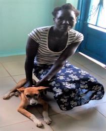 SOME HOSPITAL PATIENTS (Left) This is Akello Vicky and her 6 month old female dog Priscak. Vicky says Priscak is very loving and a good leader.