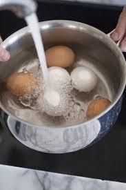 Wash eggs that are covered with chicken feces. Roll them around in a sanitizer with 1/2 oz. (14.8 ml) of chlorine to 1 gallon (3.8 l) of water. Eat eggs quickly.