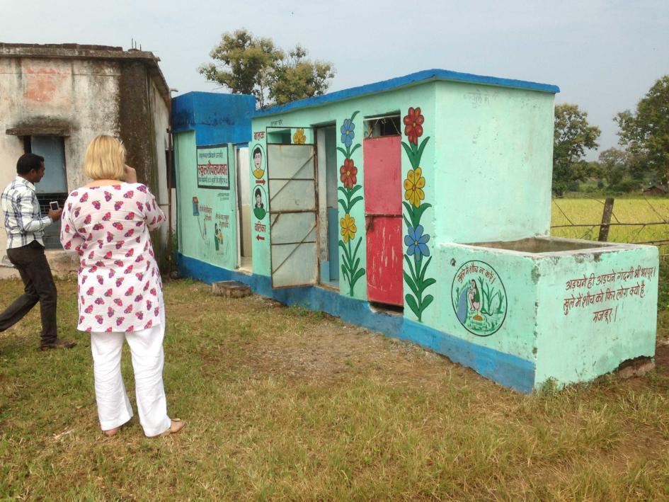 H. Dimension 4: sustainability Overarching question: What are the key factors required at country/community levels to improve the adherence to ODF behaviors? School latrine decorated by children.