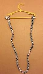 Print Outs How to Make a Harness Supplies: Fleece, plastic hanger (child or adult size), scissors Steps: Cut three longs trips of fleece, each about 1-1.5 inches wide and 54 inches long. 1. Tie the strips of fleece together at one end.