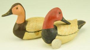 carved Canvasbacks hen and drake by Ira James