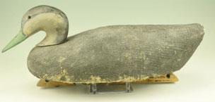 295 (2) Resin decoys and one wooden decoy: Resin ½